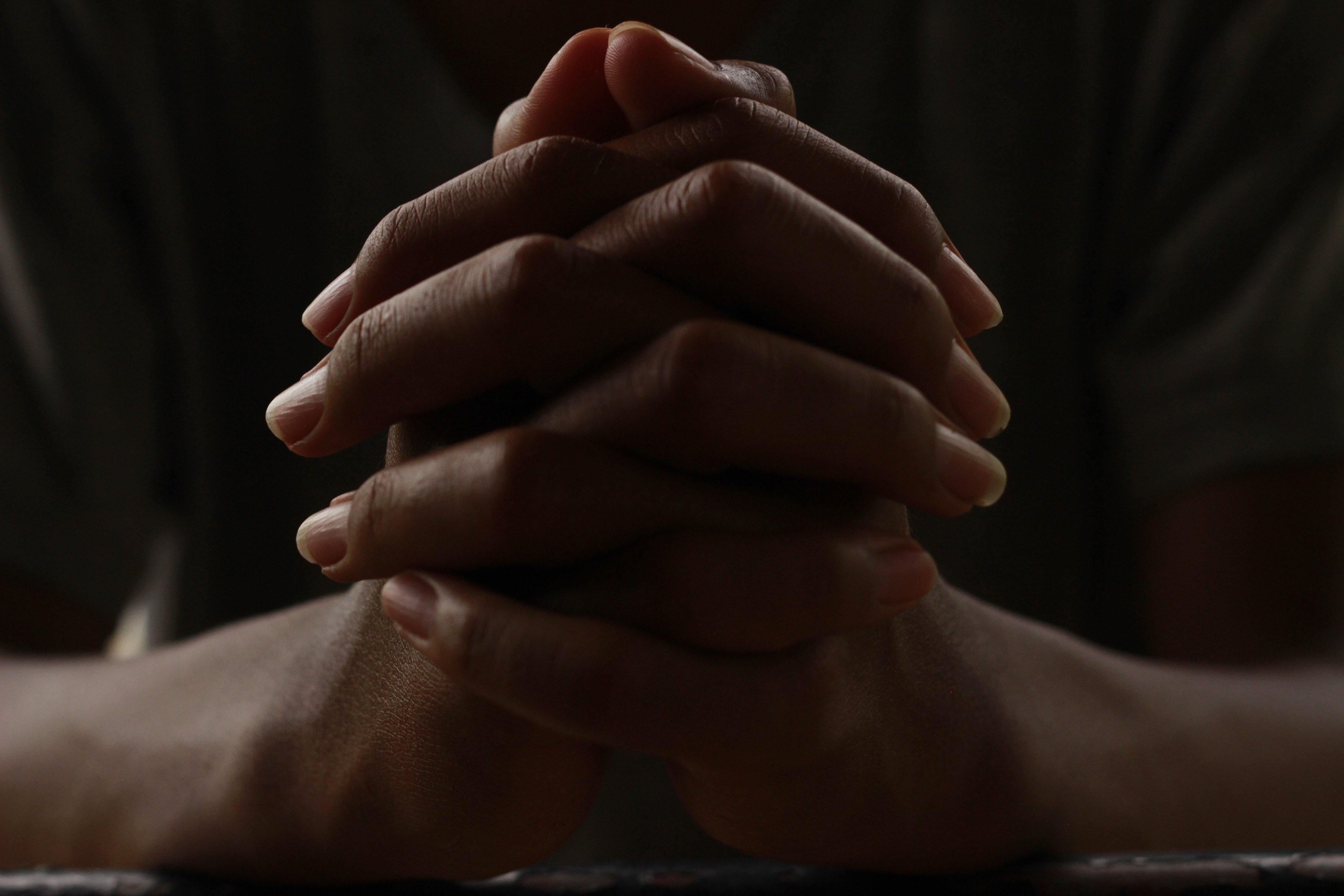 Hands lifted in prayer — the foundation of every sacrifice