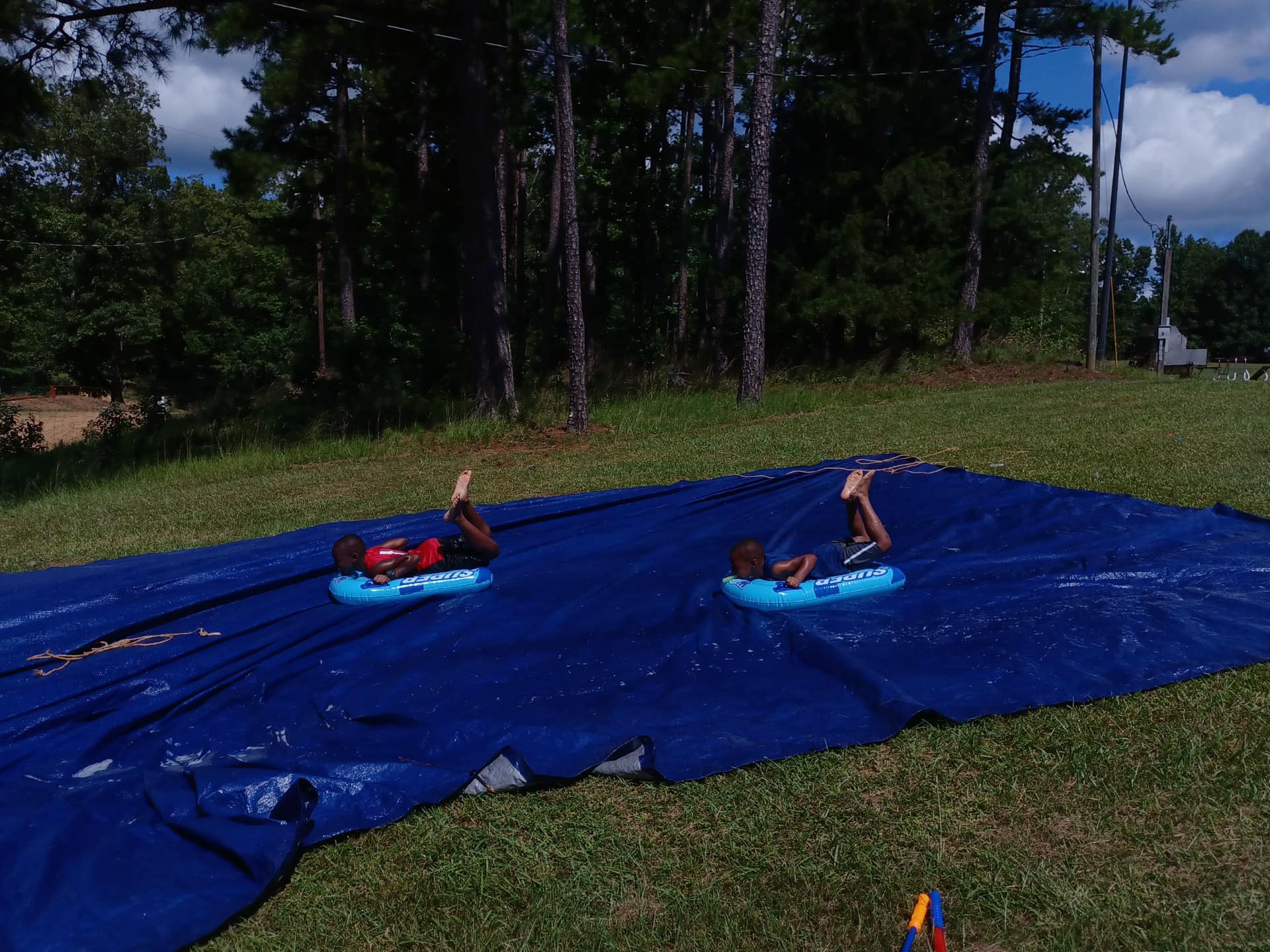 Slip and slide fun at the camp