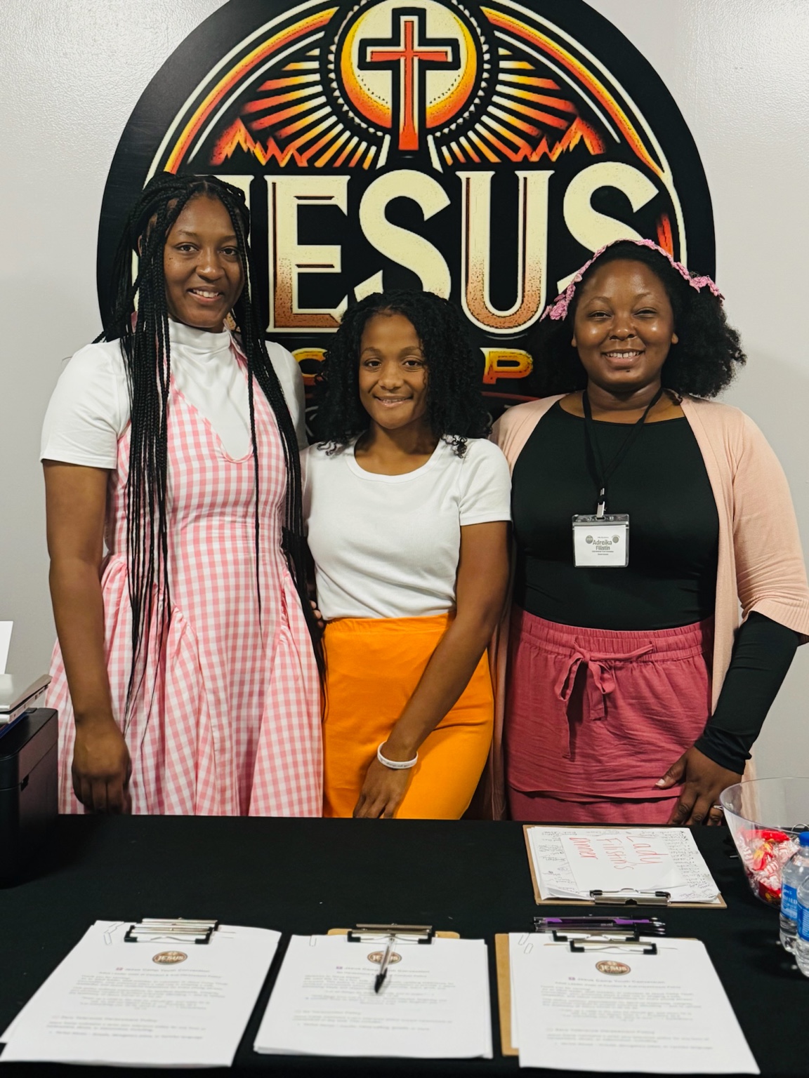 Staff member welcoming guests